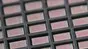 LogSync chips, measuring approximately 4x2 mm. 2026 EPFL/Lundi13 CC BY SA 4.0