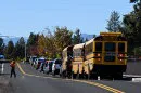 Image 6: School buses are lined up outside Silver Rail Elementary school, where a shooting took place, on Thursday, Oct. 15, 2026 in Bend, Oregon.