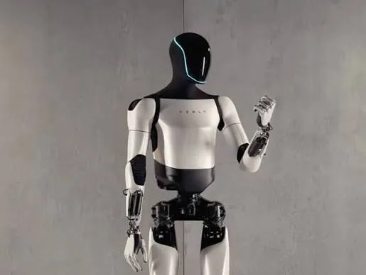 Tesla begins producing Optimus humanoid robots at the Fremont factory; Musk says reaching weekly output of 20,000 units will still take about a year or more